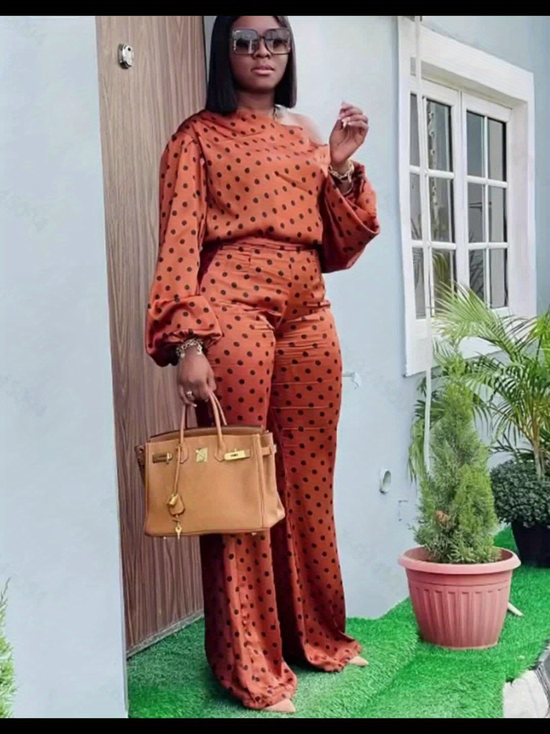 Casual Off-Shoulder Outfit for Women Featuring a Long-Sleeve Top And Loose-Fitting Long Pants with a Polka Dot Design.