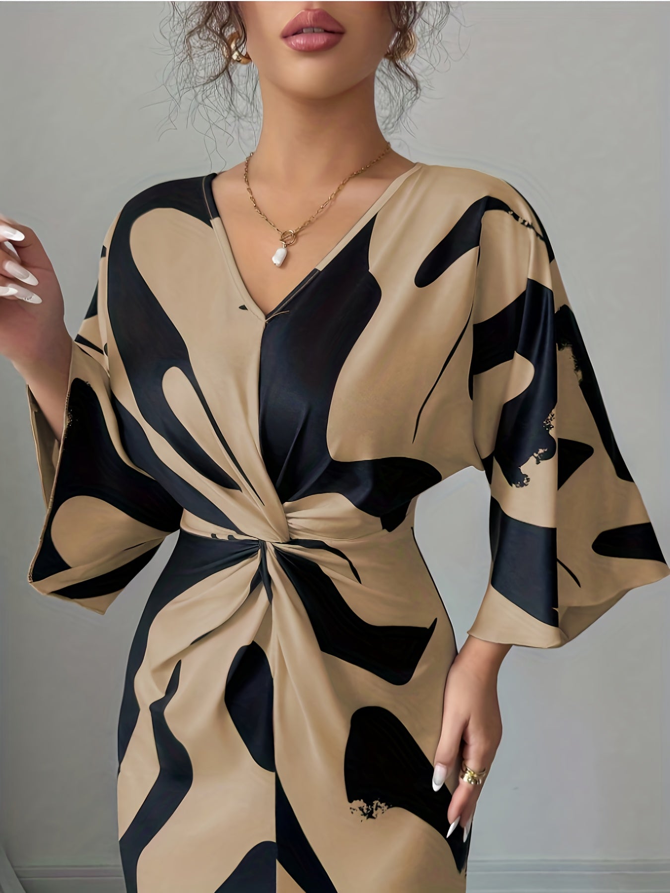 This Elegant Midi Dress Features a Unique Apricot Base Color with a Milk Digital Print, High-Stretch Fabric, a V-Neck, And a Stylish Waist Twist Design. Its Irregular Hem Adds a Niche Touch, Making It Perfect for High-End Aut