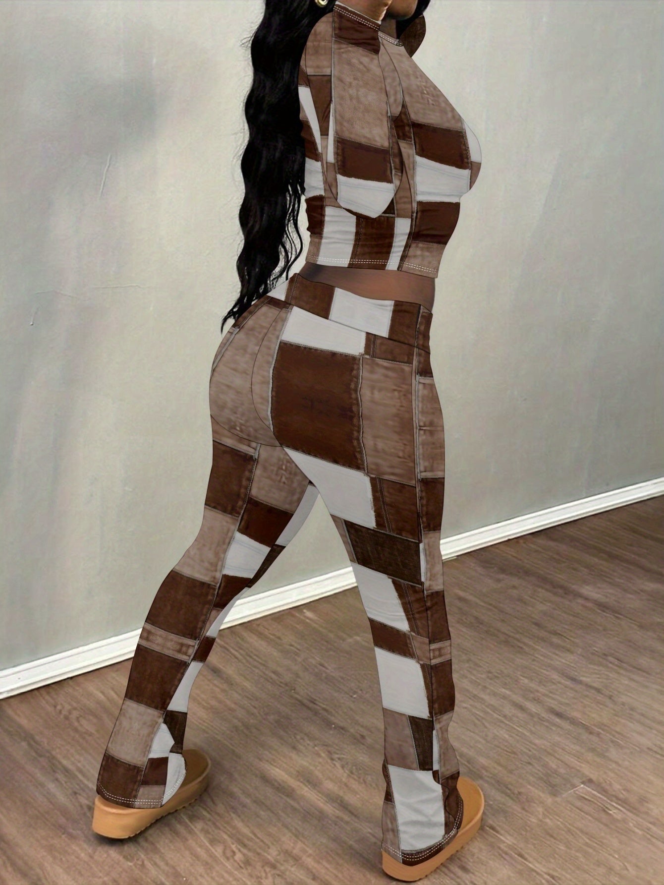 European and American style brown and white patchwork print two-piece set for women: long-sleeved cropped top + slightly flared trousers. Features visible stitching details for a unique and look.