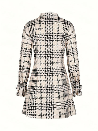 A Shirt Dress with a Houndstooth Pattern, Featuring Detailed Front Buttons And Pleats on The Front Placket.