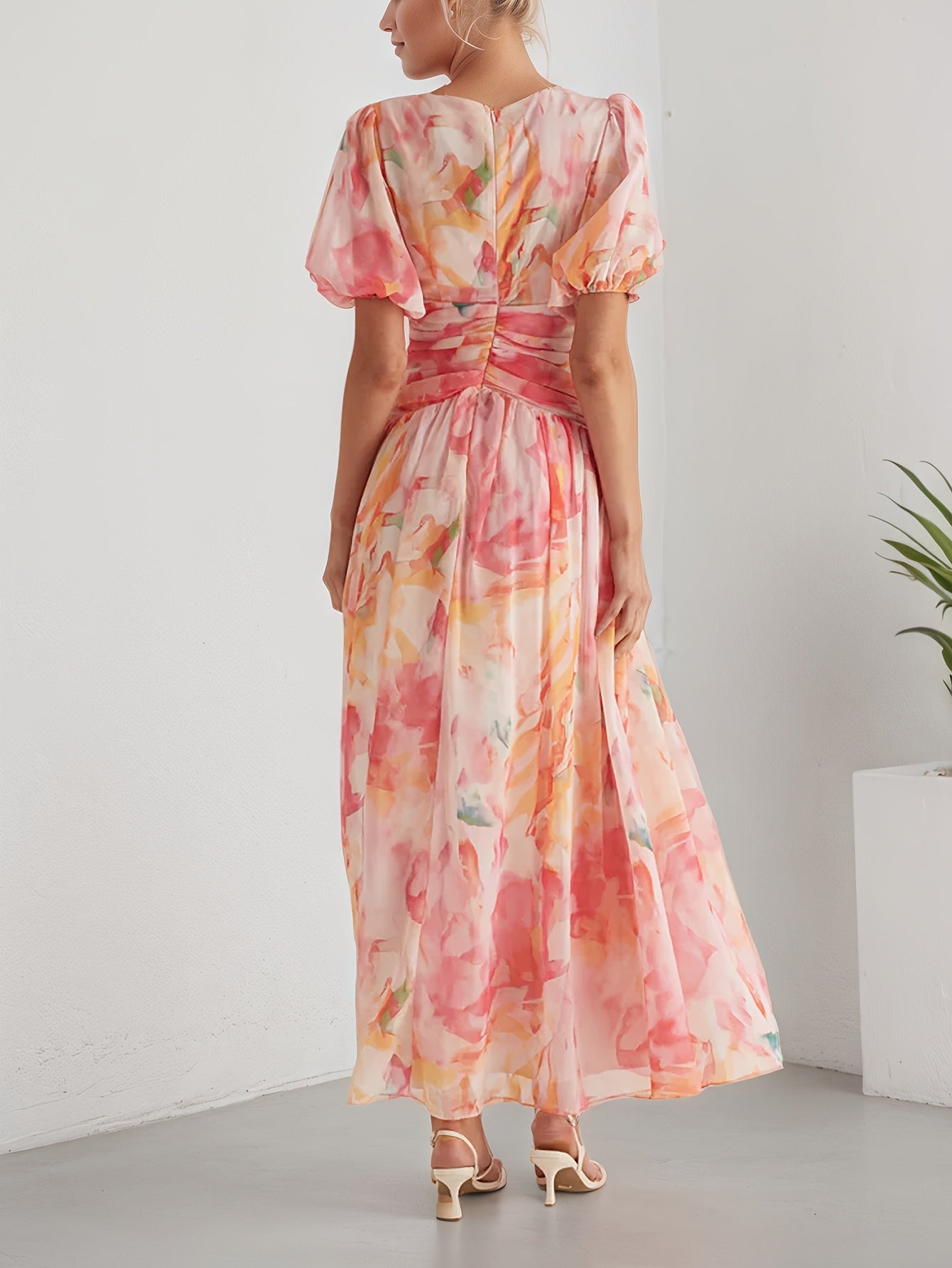 A Women'S Dress Featuring a Long Chiffon Skirt with a V-Neck And Short Sleeves, Designed with a High Waist And Print, Perfect for a Stylish And Refreshing Date Party Look