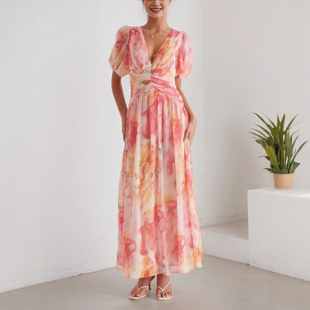 A Women'S Dress Featuring a Long Chiffon Skirt with a V-Neck And Short Sleeves, Designed with a High Waist And Print, Perfect for a Stylish And Refreshing Date Party Look