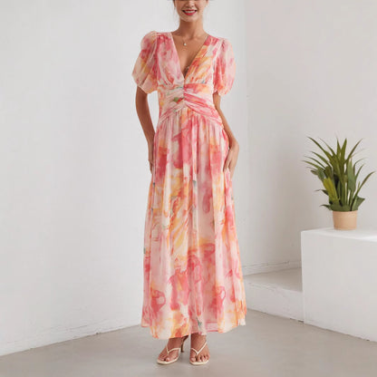 A Women'S Dress Featuring a Long Chiffon Skirt with a V-Neck And Short Sleeves, Designed with a High Waist And Print, Perfect for a Stylish And Refreshing Date Party Look