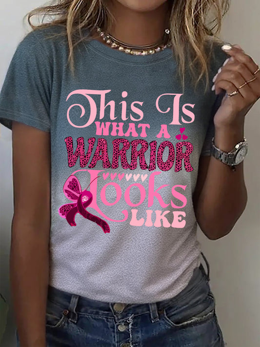Women's Breast Cancer Awareness Graphic T-Shirt - "This Is What a Warrior Looks Like" Pink Ribbon Design, Short Sleeve Crew Neck Casual Top, Soft Breathable Fabric, Machine Washable, All-Season Comfort, Motivational Text Shir