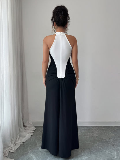 European Style Black White Spliced Maxi Dress | Halter Neck, Sleeveless, Pleated Skirt, Button Details, Elegant Wedding Guest Dress for Fall.