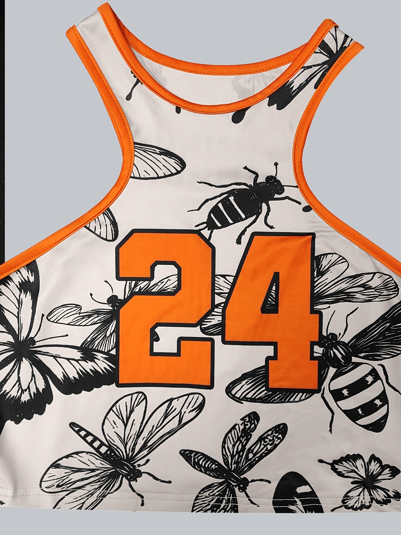 Two-piece Women's Tank Top and Shorts Set, Featuring Digital Printing, Color-block Design, Number and Animal Patterns. The Shorts Include Pockets and Drawstrings, Made from Comfortable Fabric with a Fashionable Printed Design