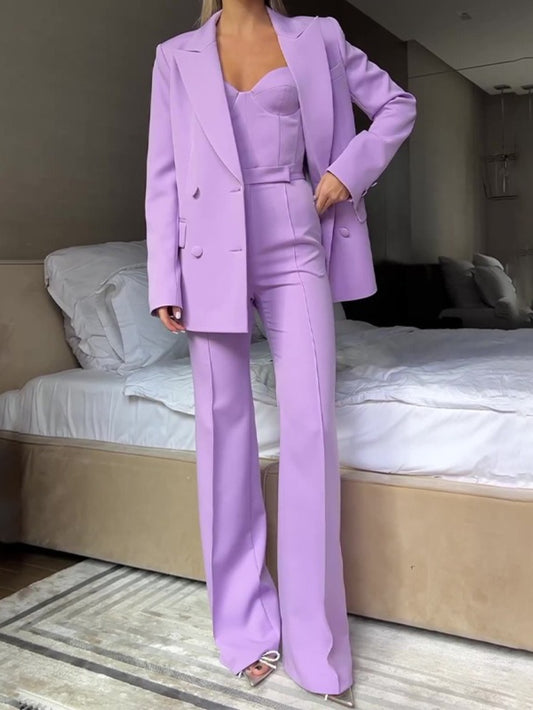 A Chic And Sophisticated Three-Piece Autumn Workwear Ensemble Featuring a Bustier, Trousers, And a Jacket.