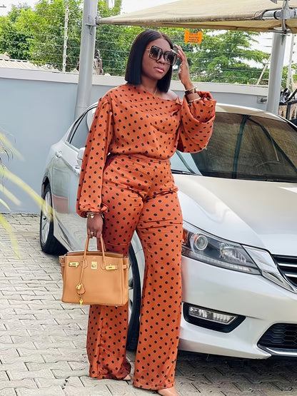 Casual Off-Shoulder Outfit for Women Featuring a Long-Sleeve Top And Loose-Fitting Long Pants with a Polka Dot Design.