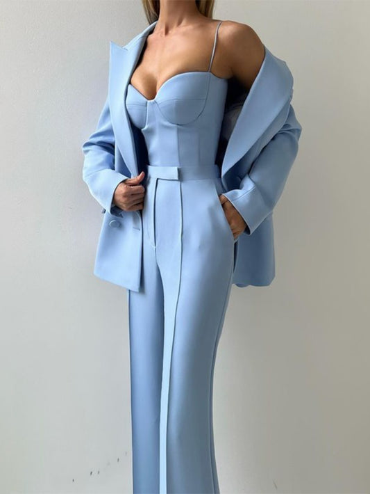 A Chic And Sophisticated Three-Piece Autumn Workwear Ensemble Featuring a Bustier, Trousers, And a Jacket.