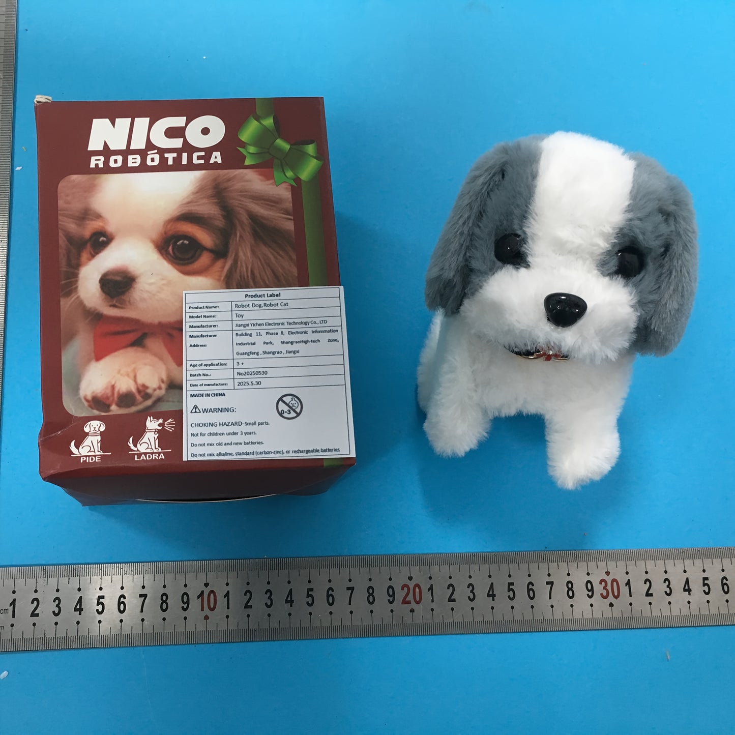 A Robotic Puppy Toy That Mimics Real Movements And Sounds - a Light Brown Plush Companion for, Designed to Aid in Motor Skills Development, Featuring a Playful Packaging And Detailed Fur Texture.