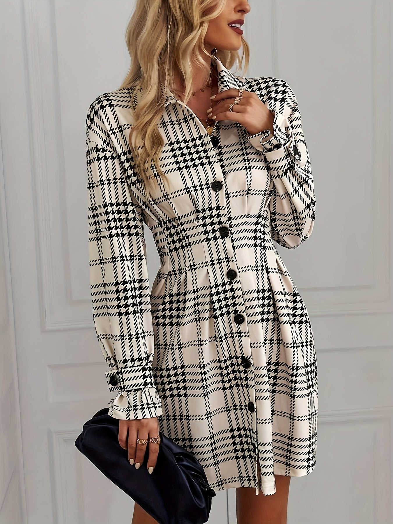 A Shirt Dress with a Houndstooth Pattern, Featuring Detailed Front Buttons And Pleats on The Front Placket.
