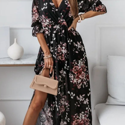 A Printed Dress with a V-Neck, Featuring a Slim Fit And a Side Slit That Brings a Lively Touch. The Elegant V-Neck Enhances Sophistication, While The Slim Design Accentuates The Silhouette. The Printed Elements Add Charm