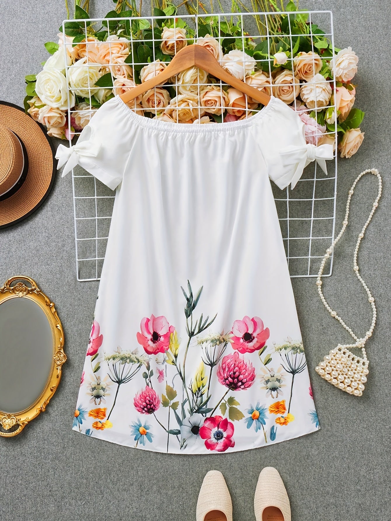A Stylish Off-Shoulder Floral Dress Perfect for Leisure, Featuring a Floral Pattern And Bow Accents, Ideal for Summer Picnics, Outings with Friends, Vacations, And Travel, Designed for Women Who Want to Look Sexy