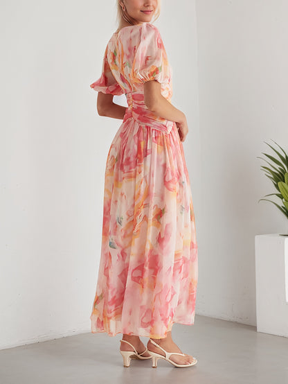 A Women'S Dress Featuring a Long Chiffon Skirt with a V-Neck And Short Sleeves, Designed with a High Waist And Print, Perfect for a Stylish And Refreshing Date Party Look