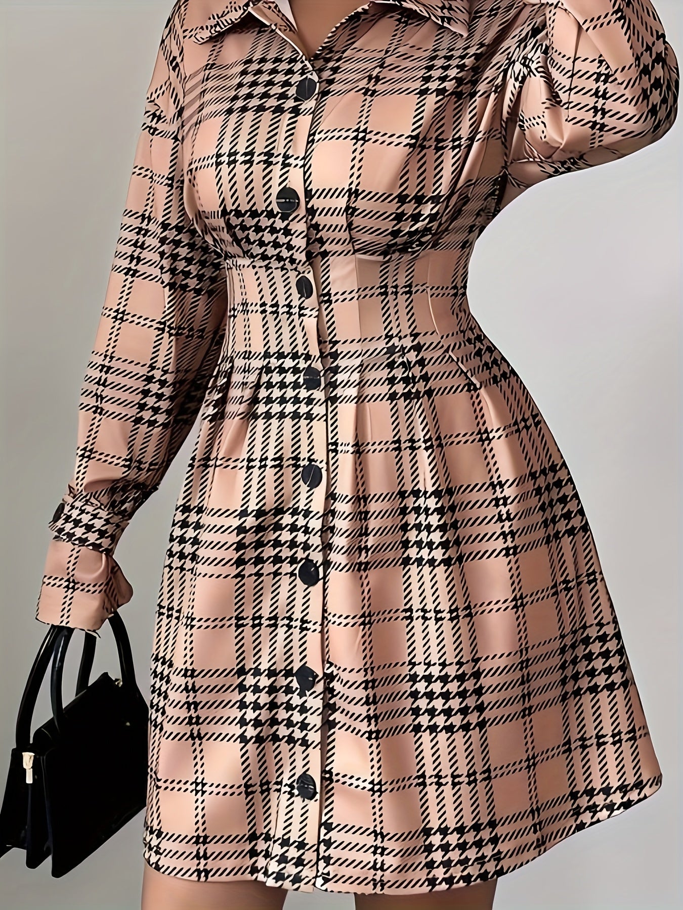 A Shirt Dress with a Houndstooth Pattern, Featuring Detailed Front Buttons And Pleats on The Front Placket.