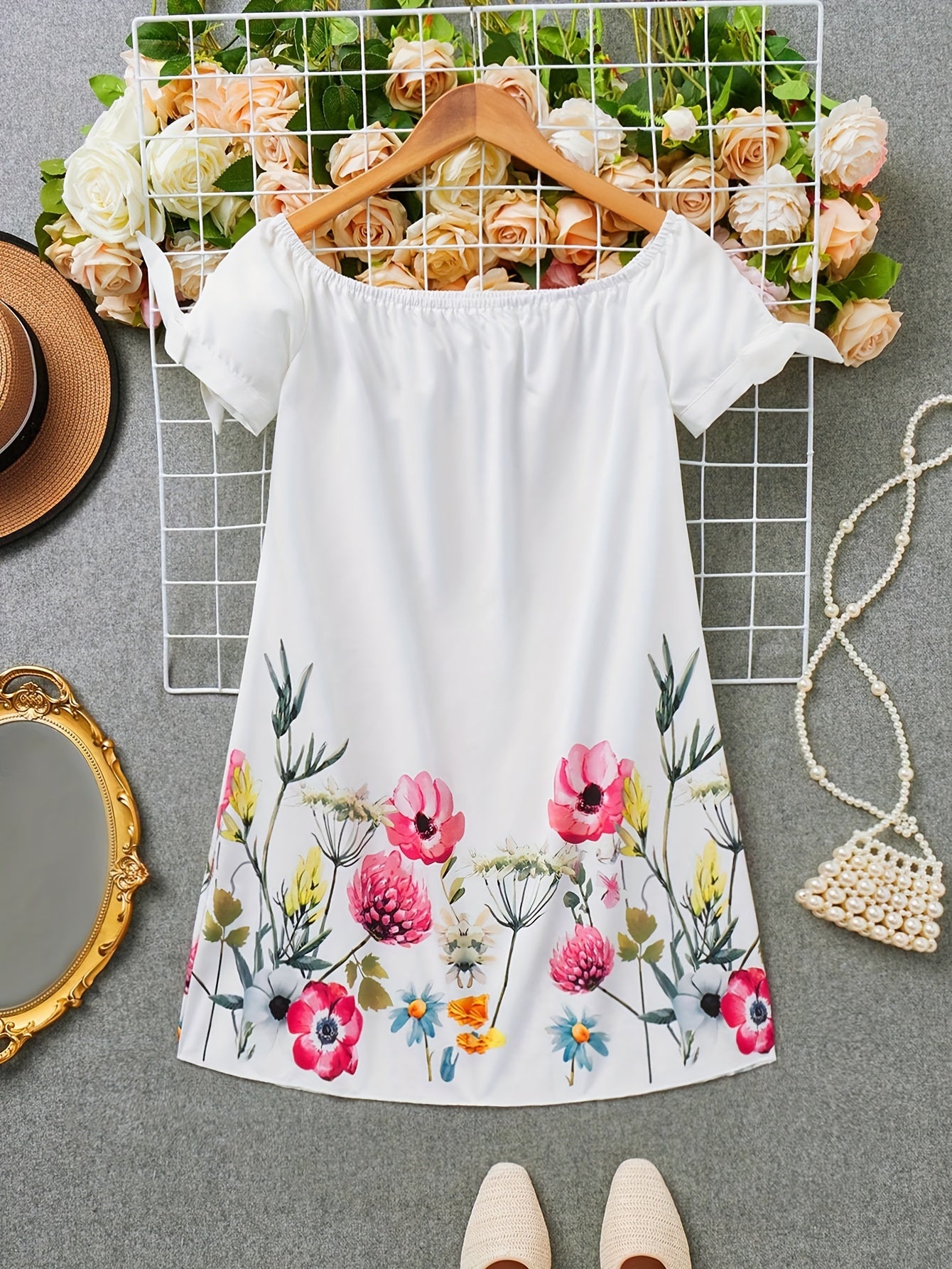 A Stylish Off-Shoulder Floral Dress Perfect for Leisure, Featuring a Floral Pattern And Bow Accents, Ideal for Summer Picnics, Outings with Friends, Vacations, And Travel, Designed for Women Who Want to Look Sexy