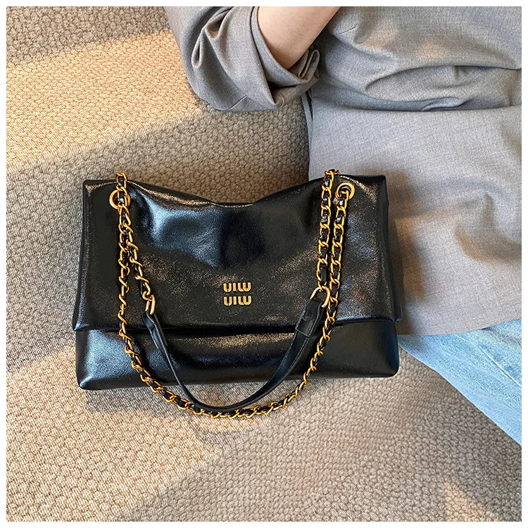2025 Women‘s Bag Retro PU Leather Underarm Bag autumn and winter Large capacity Commuting Folded Chain Shoulder Bucket Tote Bag