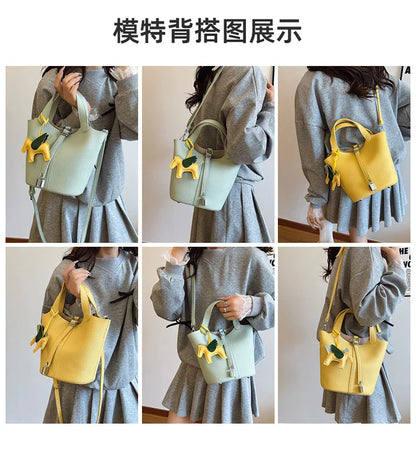 Popular and popular lychee patterned mother and child bucket bag for women, 2025 new casual retro handbag, casual commuting bag