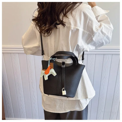 Popular and popular lychee patterned mother and child bucket bag for women, 2025 new casual retro handbag, casual commuting bag