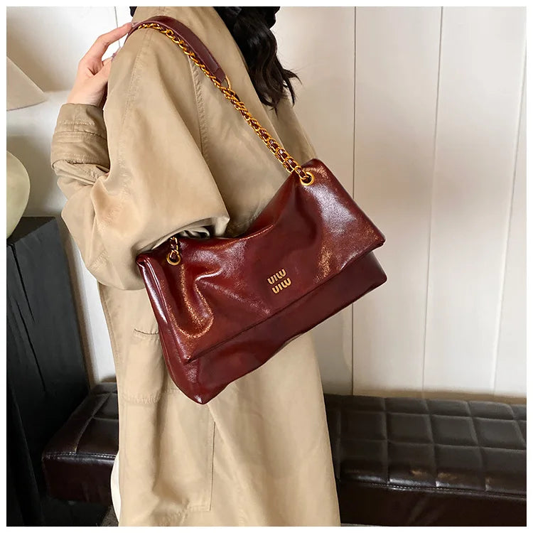 2025 Women‘s Bag Retro PU Leather Underarm Bag autumn and winter Large capacity Commuting Folded Chain Shoulder Bucket Tote Bag