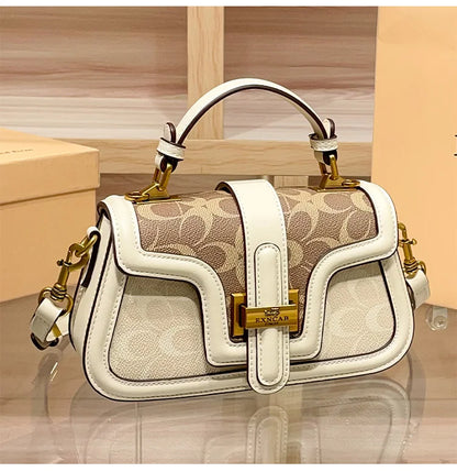 Light luxury niche design contrasting color saddle bag 2025 new high-end handbag versatile single shoulder crossbody bag