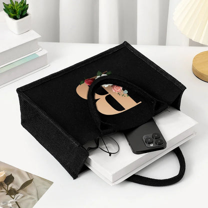 Black hand-held canvas bag, 26 letter printed women's handbag, large capacity portable leisure beach bag, indoor waterproof