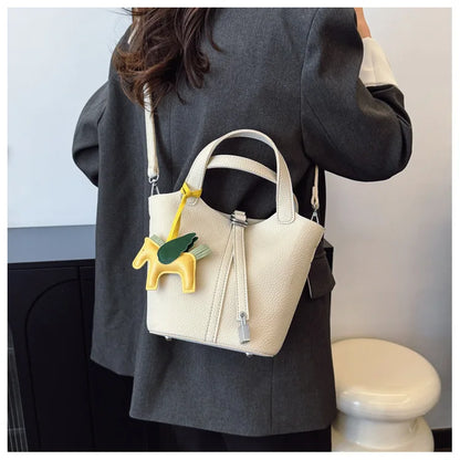 Popular and popular lychee patterned mother and child bucket bag for women, 2025 new casual retro handbag, casual commuting bag