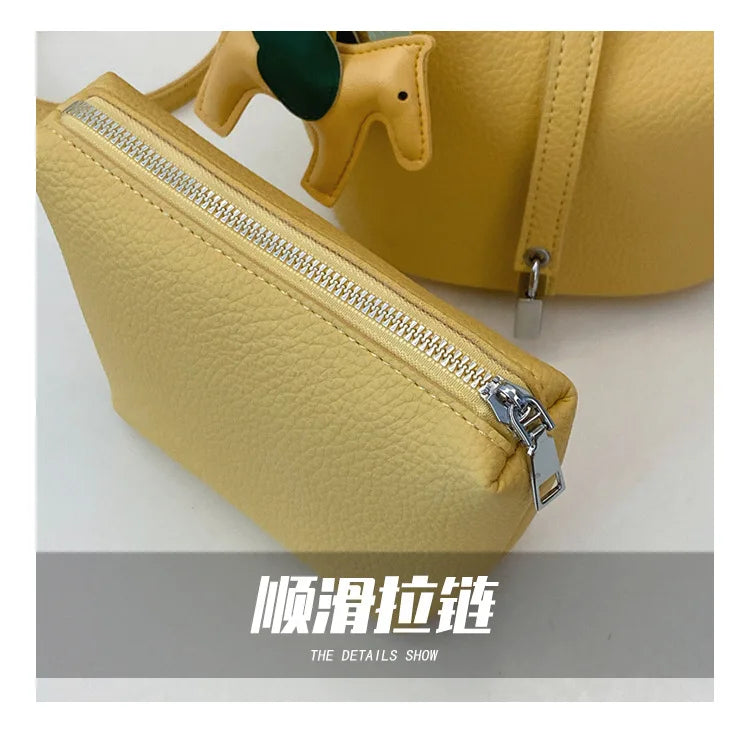 Popular and popular lychee patterned mother and child bucket bag for women, 2025 new casual retro handbag, casual commuting bag
