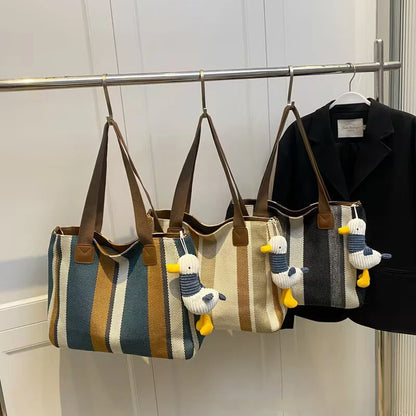 Tote Bag for Women Large Capacity Canvas Striped Shoulder Bag with Cute Pendant Commute Handbag Casual Versatile Crossbody Bag