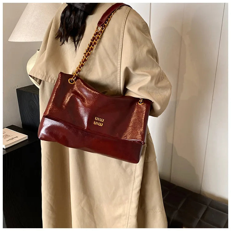 2025 Women‘s Bag Retro PU Leather Underarm Bag autumn and winter Large capacity Commuting Folded Chain Shoulder Bucket Tote Bag