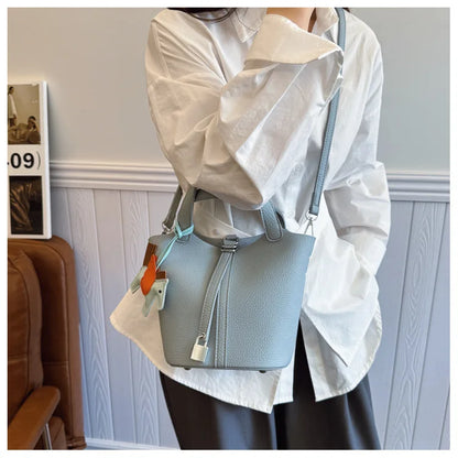 Popular and popular lychee patterned mother and child bucket bag for women, 2025 new casual retro handbag, casual commuting bag