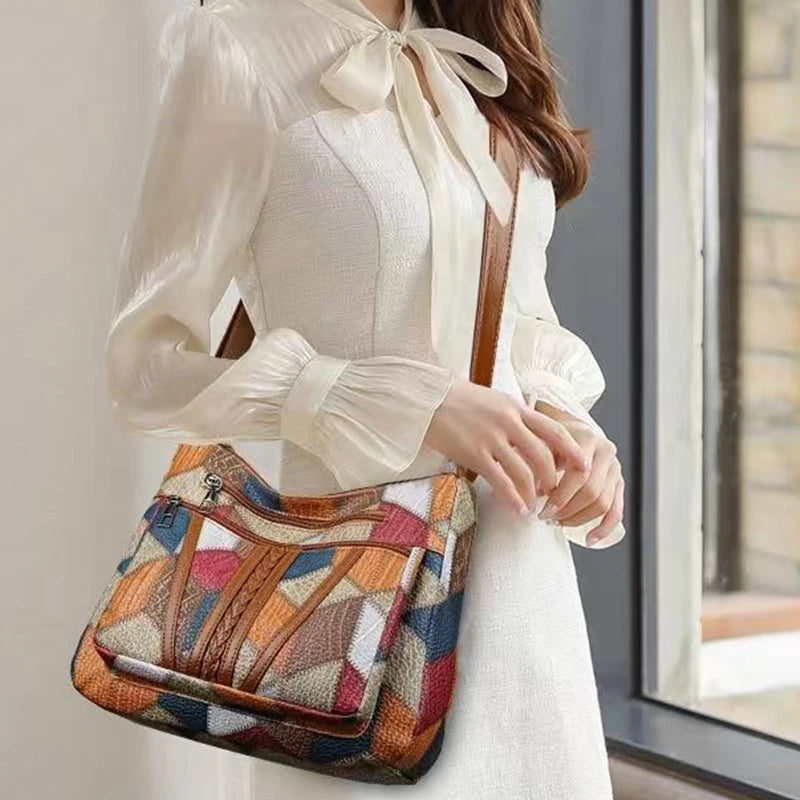 Neutral style backpack for moms with a strap design. Single shoulder bag with a patchwork pattern. Adjustable shoulder strap.