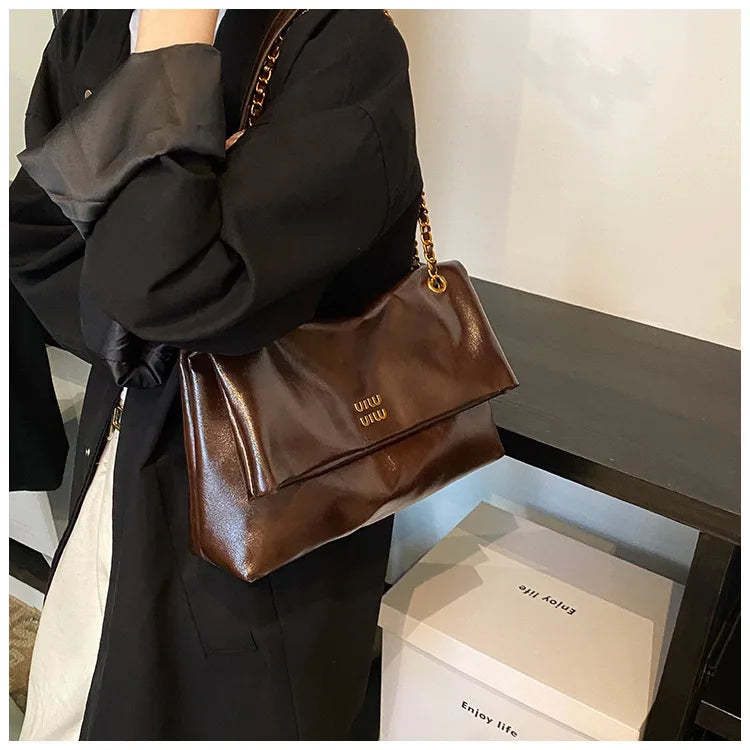 2025 Women‘s Bag Retro PU Leather Underarm Bag autumn and winter Large capacity Commuting Folded Chain Shoulder Bucket Tote Bag