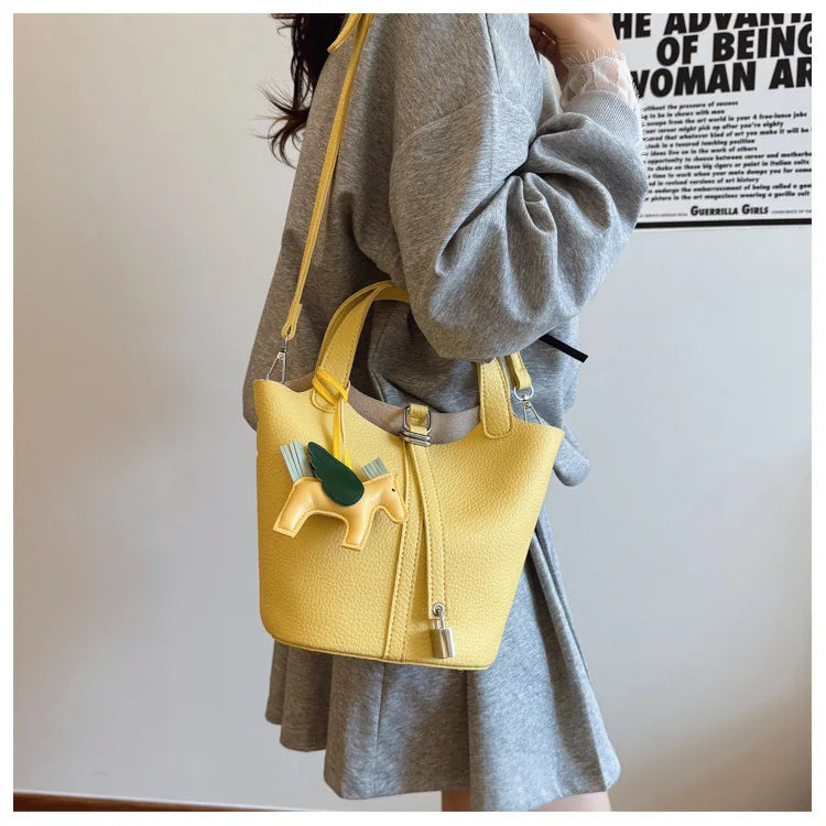 Popular and popular lychee patterned mother and child bucket bag for women, 2025 new casual retro handbag, casual commuting bag
