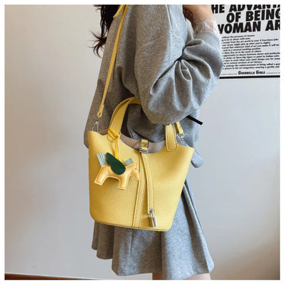 Popular and popular lychee patterned mother and child bucket bag for women, 2025 new casual retro handbag, casual commuting bag
