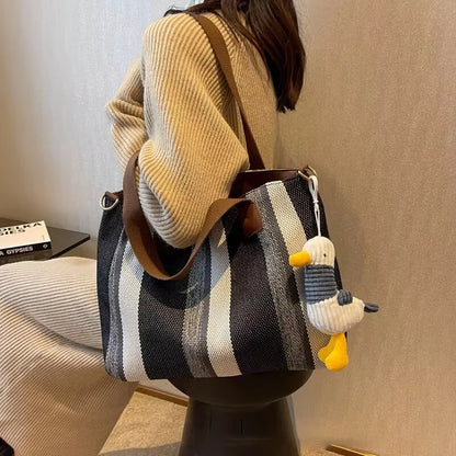 Tote Bag for Women Large Capacity Canvas Striped Shoulder Bag with Cute Pendant Commute Handbag Casual Versatile Crossbody Bag
