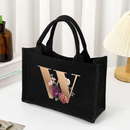 Black hand-held canvas bag, 26 letter printed women's handbag, large capacity portable leisure beach bag, indoor waterproof