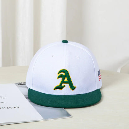 Hip-hop style baseball cap with a flat top, color patching, letter embroidery. Suitable for both women and men