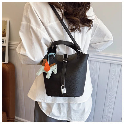 Popular and popular lychee patterned mother and child bucket bag for women, 2025 new casual retro handbag, casual commuting bag