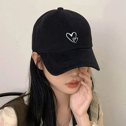 Heart-shaped printed baseball caps, Korean-style baseball caps, outdoor sun hats, all-season hats for both men and women