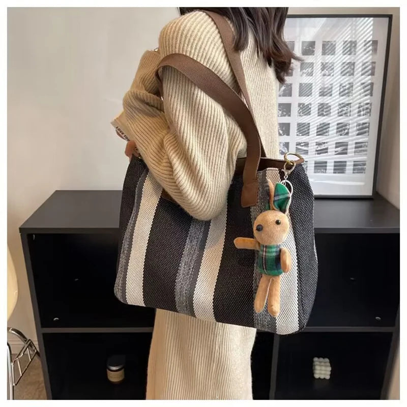 Tote Bag for Women Large Capacity Canvas Striped Shoulder Bag with Cute Pendant Commute Handbag Casual Versatile Crossbody Bag