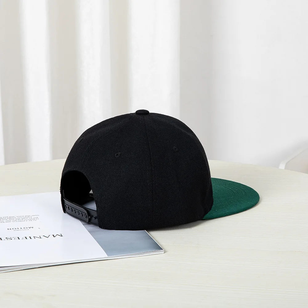 Hip-hop style baseball cap with a flat top, color patching, letter embroidery. Suitable for both women and men