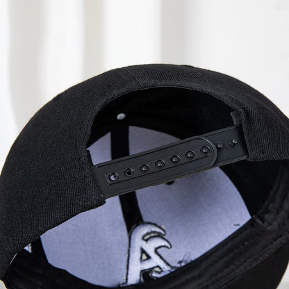 Hip-hop style baseball cap with a flat top, color patching, letter embroidery. Suitable for both women and men