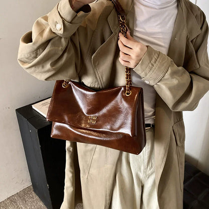 2025 Women‘s Bag Retro PU Leather Underarm Bag autumn and winter Large capacity Commuting Folded Chain Shoulder Bucket Tote Bag