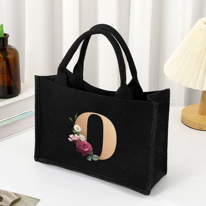 Black hand-held canvas bag, 26 letter printed women's handbag, large capacity portable leisure beach bag, indoor waterproof