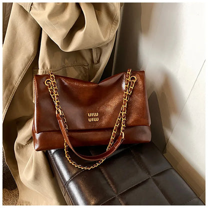 2025 Women‘s Bag Retro PU Leather Underarm Bag autumn and winter Large capacity Commuting Folded Chain Shoulder Bucket Tote Bag