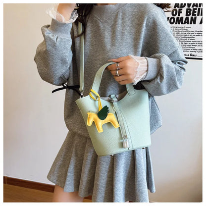 Popular and popular lychee patterned mother and child bucket bag for women, 2025 new casual retro handbag, casual commuting bag