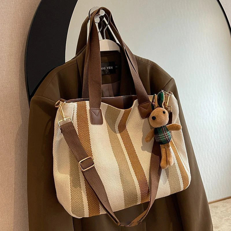 Tote Bag for Women Large Capacity Canvas Striped Shoulder Bag with Cute Pendant Commute Handbag Casual Versatile Crossbody Bag