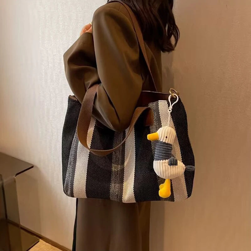 Tote Bag for Women Large Capacity Canvas Striped Shoulder Bag with Cute Pendant Commute Handbag Casual Versatile Crossbody Bag