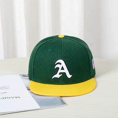 Hip-hop style baseball cap with a flat top, color patching, letter embroidery. Suitable for both women and men